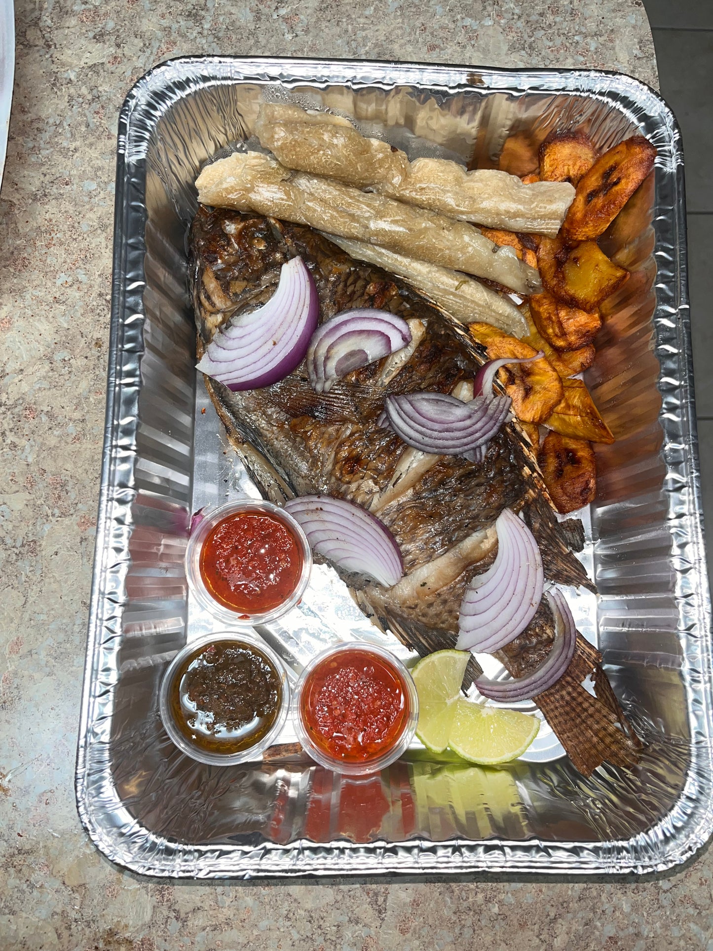 Tilapia With Plantain & Bobolo(Cassava Sticks)