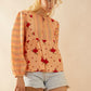 Copriandra Peplum Top