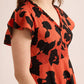 Jungle Serenade Empire Waist Dress In Orange