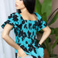 Bailey in Bold Peplum Top In Blue And Black