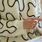 Twist of West Knitted Sweater in Canyon White