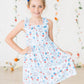 Baby You're a Firework Ruffle Cross Back Dress