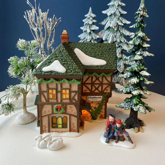 Illuminated Christmas Village T. Puddlewick Spectacle Shop by Dept. 56. Dickens' Village. Seasonal Home Retail Decor. Night Light.