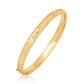 14k Yellow Gold Diamond Cut Design Dome Motif Childrens Bangle (5.50 mm)