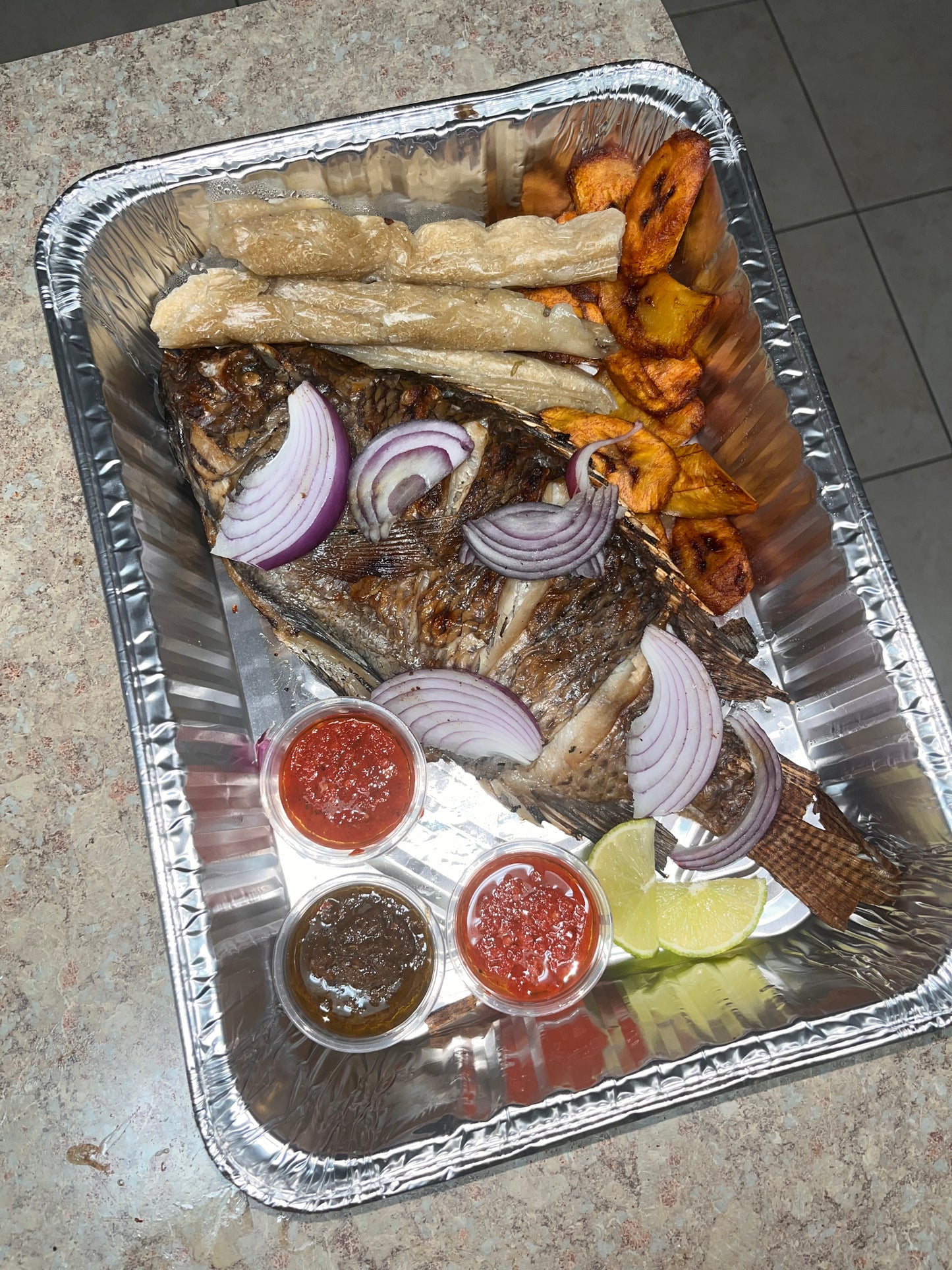 Tilapia With Plantain & Bobolo(Cassava Sticks)