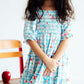 Honor Roll Smocked Ruffle Dress