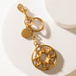 Myra Legacy Loop Charm in Antique Gold
