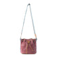 Myra Emberlace Embossed Leather Bucket Bag in Berry Rouge