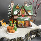 Christmas Village Farm House with Red Roof. Illuminated Building Holiday Decoration.