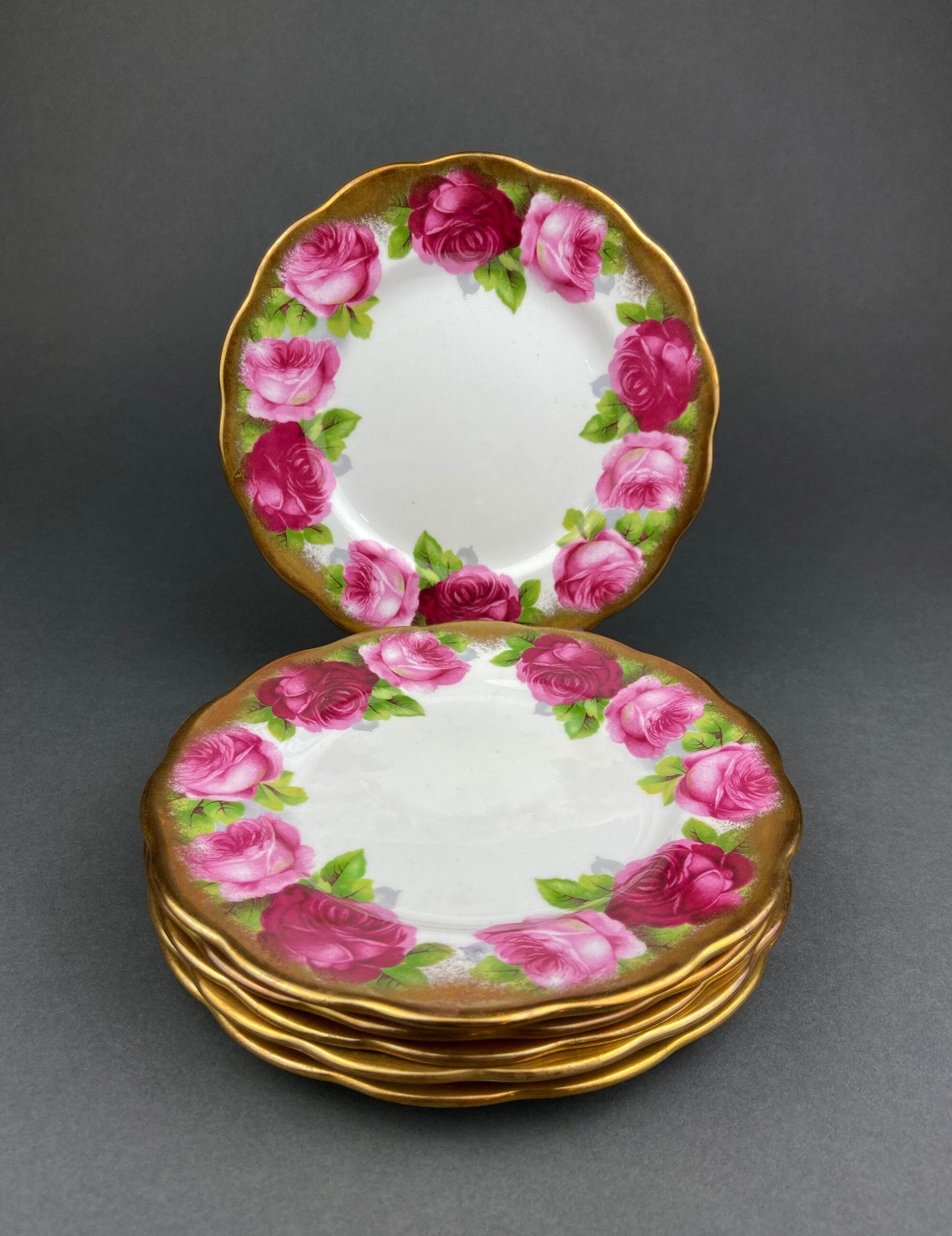 Royal Albert Set of Six Dessert Plates and One Serving Plate  with Old English Rose Pattern.  Made in England.