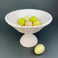Pink Milk Glass Footed Fruit Bowl. Modern Quilt Pattern on the Outside of a Bowl. Floral Design Inside a Bowl.