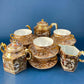 Antique Japanese Moriage Tea Cup Set. Gold Hand Painted Teaware with Teapot, Sugar Bowl, Creamer, and Six Japanese Tea Cups.