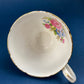 Royal Stafford Cup and Saucer. Black with Gold. Hand Painted Flower Bouquet Inside of Cup and on the Plate.