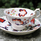 Porcelain teacup and saucer - Hand painted in Japan