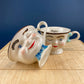 Bailey's Winking Face Creamer with Blue Bow - Yum Collectible Limited EditionCreamer