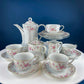Antique Hutschenreuther Porcelain Coffee Set. Coffee or Teapot, Sugar Jar, Creamer, 2 8" Dessert Plates, & 6 Tea Cups/Saucers. Floral Motif.