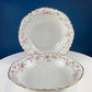 Antique Porcelain Serving Dishes. Set of Five Hutschenreuter Platters and Bowls with Pink Rose Garlands Motif.