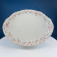 Antique Porcelain Serving Dishes. Set of Five Hutschenreuter Platters and Bowls with Pink Rose Garlands Motif.