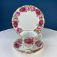 Black Cup and Saucer with Roses on White Background Inside the Cup. Royal Albert Old Country Rose Tea Set. Hand Painted Pink & Red Roses.