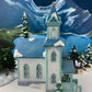 Christmas Village Cedar Valley Chapel Towne Series. Illuminated Blue Church with Stained Glass Window. Santa's Workbench. Night Light.