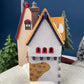 Tassy's Mittens and Hassel's Woolies by Department 56. Illuminated Christmas Village House. North Pole Series.