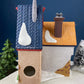 Tassy's Mittens and Hassel's Woolies by Department 56. Illuminated Christmas Village House. North Pole Series.