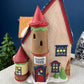 Tassy's Mittens and Hassel's Woolies by Department 56. Illuminated Christmas Village House. North Pole Series.