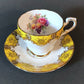 Tea Cup and Saucer by Paragon Made in England in Yellow, Gold, Pink