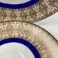 Antique Bavarian Porcelain Tea Trio. Z and Co, Tirschenreuther. Cup, Saucer, and Dessert Plate in Rich Gold and Blue. Modern Floral Pattern.