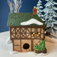 Illuminated Christmas Village T. Puddlewick Spectacle Shop by Dept. 56. Dickens' Village. Seasonal Home Retail Decor. Night Light.