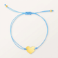 9 1/4 inch Blue Cord Adjustable Bracelet with 14k yellow Gold Heart