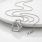 Sterling Silver Dual Heart Motif Pendant with Diamonds (.06 cttw)