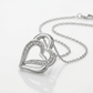 Sterling Silver Dual Heart Motif Pendant with Diamonds (.06 cttw)