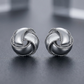 Textured and Polished Love Knot Earrings in Sterling Silver