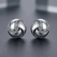 Textured and Polished Love Knot Earrings in Sterling Silver