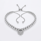 Adjustable Bead Bracelet with Round Charm Cubic Zirconias in Sterling Silver