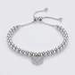 Adjustable Bead Bracelet with Round Charm Cubic Zirconias in Sterling Silver