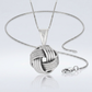 Sterling Silver Pendant with a Ridge Textured Love Knot Design