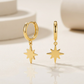 14k Yellow Gold Huggie Style Hoop Earrings with Star Drops