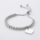Adjustable Shiny Bead Bracelet with Heart Charm in Sterling Silver