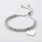 Adjustable Shiny Bead Bracelet with Heart Charm in Sterling Silver