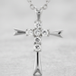 Avera Coupled Cross Pendant In Polished Silver