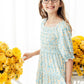 Buttercup Blooms Smocked Ruffle Dress